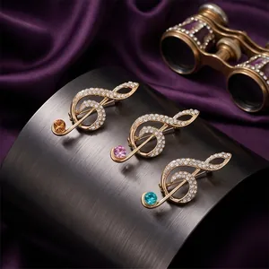 Elegant gold musical note brooches with sparkling rhinestones and colorful gems.