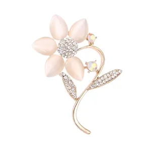 Elegant cat's eye stone flower brooch with sparkling crystals for suits and dresses