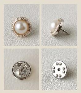 Multi-angle detail of anti-exposure pearl button pin with metal clutch back.