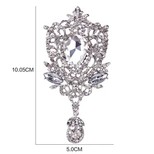 Ornate vintage crystal waterdrop brooch showing dimensions 10.05cm height detail view