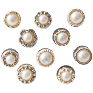 Assorted set of decorative pearl pins for shirts and anti-exposure pins on white background
