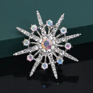 Elegant silver-toned eight-pointed star brooch with sparkling iridescent rhinestones