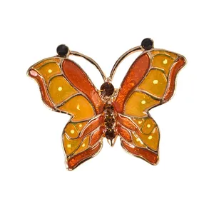 Elegant vintage orange enamel butterfly brooch pin for women with crystal rhinestone accents