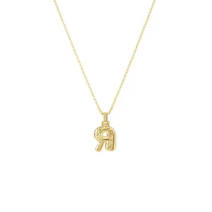 Elegant gold initial necklace with intricate floral engraved letter pendant jewelry