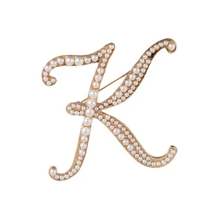 Elegant gold-tone pearl initial letter K brooch pin for vintage apparel and clothing decoration
