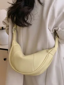 Große Damen-Halbmondtasche in weichem Hellgelb, ideal für den täglichen Pendelverkehr.