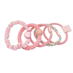 Set of five sweet pink dopamine elastic hair ties with cute heart and bear charms for girls