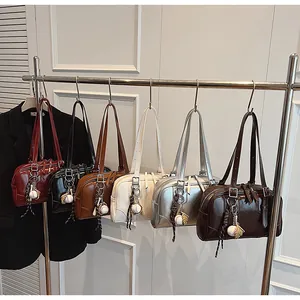 Detailed view of fashionable large capacity women's shoulder bags in various colors