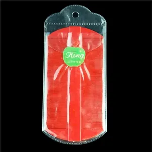 Red double-sided fine-tooth lice comb for scalp care and nit removal in clear case