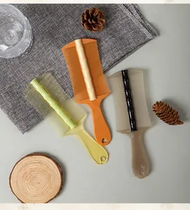 Detail view of three colorful double-sided bamboo-style nit combs for scalp cleaning.