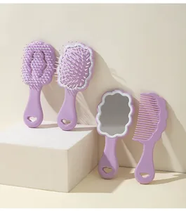 Four-piece lavender cloud-shaped hairbrush and vanity mirror styling set on a block