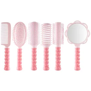 6-piece baby pink hair brush and makeup mirror styling set with unique twisted handles