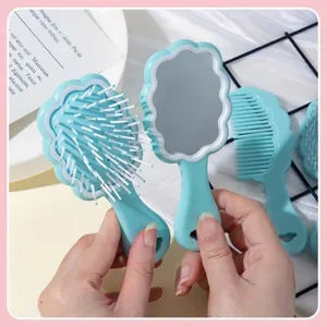 Portable light blue cloud-shaped hairbrush and mirror set for girls, ergonomic handheld design