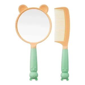 Cute cat-themed handheld vanity mirror and hair comb set in pastel colors