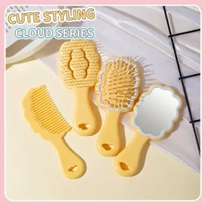 Yellow cloud-shaped hairbrush and handheld mirror grooming set for children and girls.