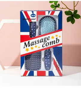 Close-up view of two-piece star print hair massage comb set in Union Jack box