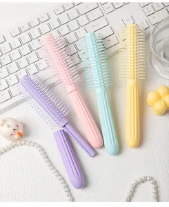 Professional macaron color round hairbrushes for volume and styling on white background