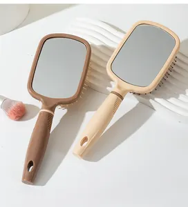 Vue détaillée des brosses à cheveux de massage à coussin d'air avec miroirs intégrés