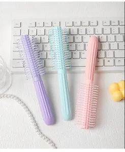 Set of macaron colored round barrel hairbrushes with anti-slip handles for styling