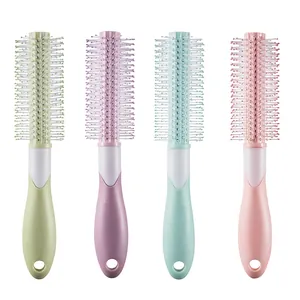 Four pastel round hairbrushes set for volumizing and styling women's long hair