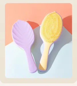 Cepillo de massage del cuero cabelluto en forma de hoja para desenredar y peinar el cabello
