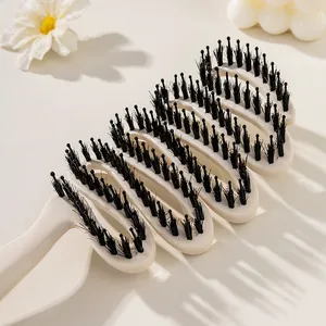 Professional vented boar bristle hair brush in ribbon design for detangling and volume styling