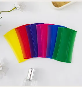 Colorful double-sided fine-tooth pet combs for flea and nit removal from dog and cat fur.