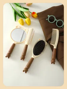 Detail view of 4-piece cute cat-themed hair brush and mirror grooming set