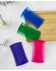 Close-up of colorful double-sided fine-tooth flea combs for cat and dog grooming
