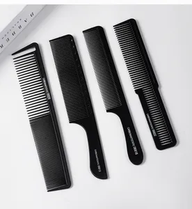 Professional set of four black anti-static hair combs for salon styling and cutting.