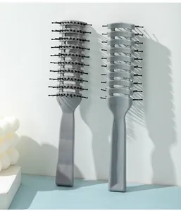 Two professional grey vented hairbrushes for men's hair styling and scalp massage