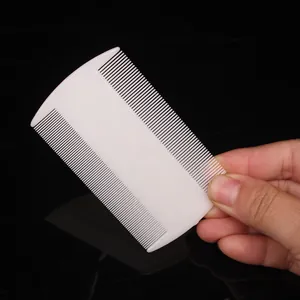 White double-sided fine-tooth plastic flea and nit comb for professional pet grooming