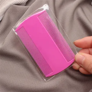 Double-sided pink plastic pet flea comb for grooming and cleaning your furry animals