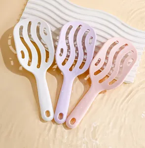Set of three colorful hollow vented hairbrushes for wet and dry hair scalp massage use