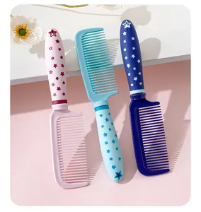 Set of three colorful hair combs with star print handles in pink, light blue, and navy.