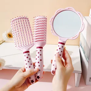 Cute pink hairbrush and hand mirror set with star pattern handles for girls hair styling