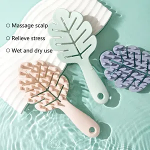Leaf-shaped silicone scalp massage brush for hair washing, wet and dry dual use.
