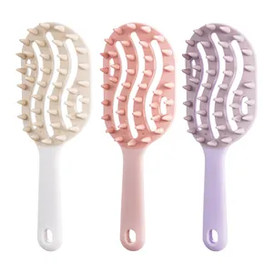 Minimalist hollow long-handle scalp massage hair brush set in pastel pink, purple, and beige.