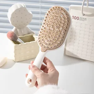 Cepillo de pelo ventilado ergonomico para dar volumen y masajear el cuero cabelludo