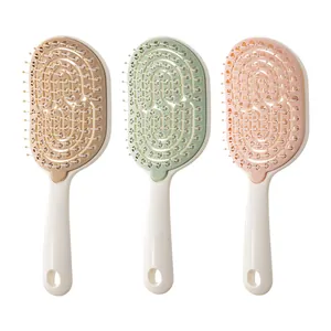 Juego de tres cepillos de pelo de masaje profesionales huecos en colores pastel para peinar