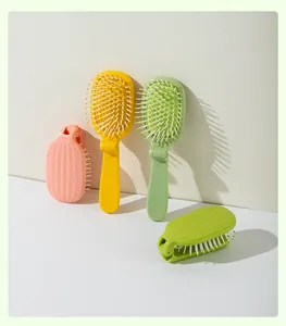 Cactus-shaped folding hairbrushes in multiple colors shown in open and closed states
