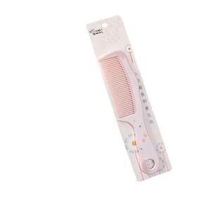 Pink daisy pattern hair comb with ergonomic handle for gentle detangling and styling