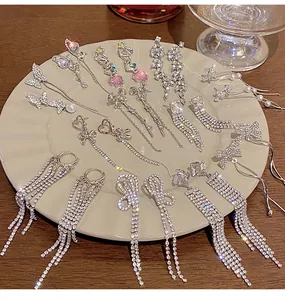 Detail view showing variety of elegant rhinestone long tassel earrings for women