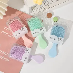 822 portable mini airbag massage hair brushes in pastel macaron colors for women and kids.