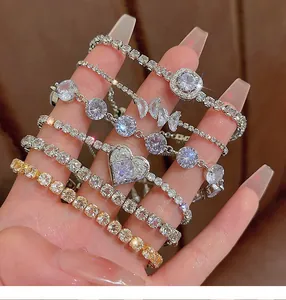 Close-up of elegant silver zircon bracelets with various sparkling crystal designs