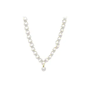 Elegant retro gold chain necklace with woven pearls, crystals and a central pearl drop