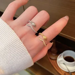 Elegant gold and silver twisted snake open rings with sparkling micro-pave stones for women