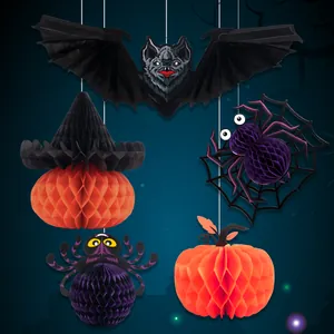 Detailed view of 3D honeycomb Halloween hanging ornaments including bat and pumpkin
