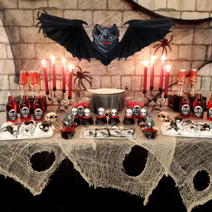 Large 3D honeycomb bat hanging decoration for spooky Halloween party table decor.