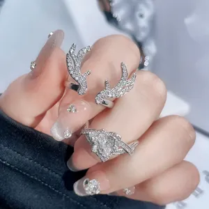 Silver antler and clover crystal open rings for women with elegant paved stones